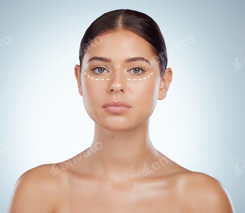 Preview: Portrait of woman with dotted line marking undereye for eyelift surgery. Caucasian model isolated a