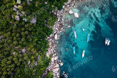 Preview: Bay and boats form above in island