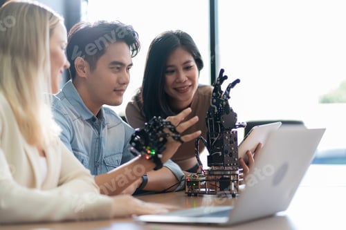 Preview: Young students researching inventions with modern technology