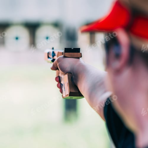 Preview: Woman on sport shooting training shooting target