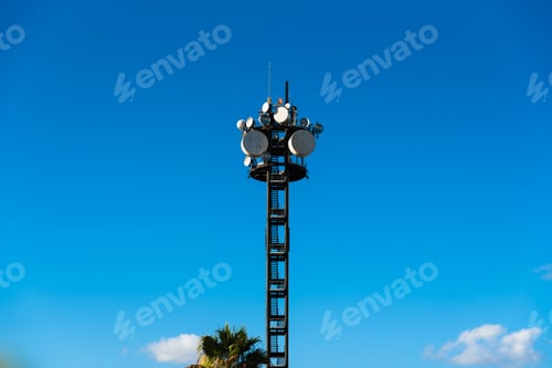 Preview: Large telecommunications tower full of radio and television broadcast antennas.
