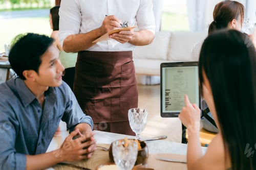 Preview: Engaging Service at the Eatery, Clients Enjoying Conversations while Waitstaff Attend