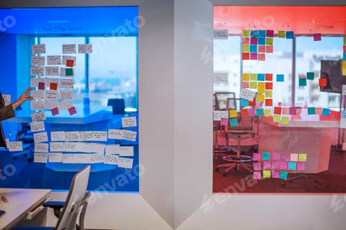 Preview: Sticky notes on a glass pane in modern office