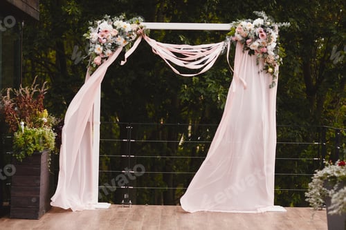 Preview: wedding decor with arch on the outside with pink and white roses and white fabric