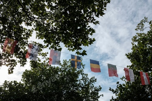 Preview: flags of european countries hang on the street