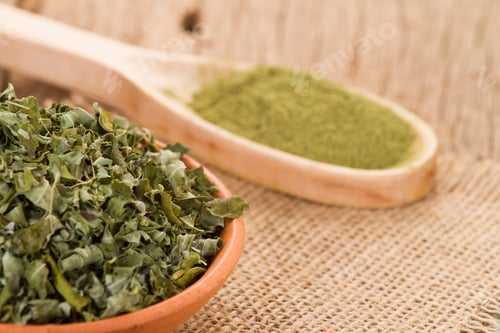 Preview: Moringa Powder and Dried Leaves on Burlap