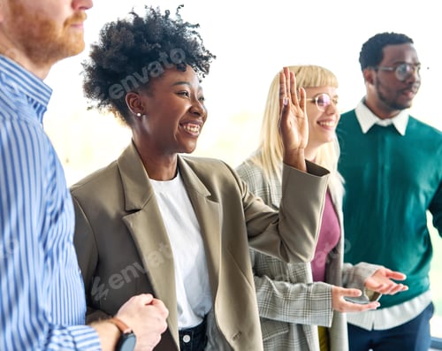 Preview: Young people having a meeting in the office