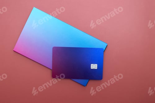 Visualização: Mockup of a blue, credit card on a red background. copy space for your design.