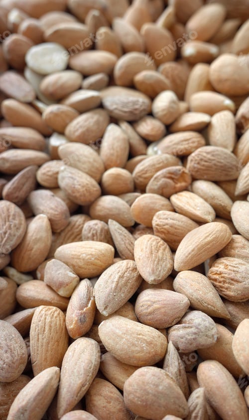 Preview: Close up photo of dried natural almonds, selective focus.