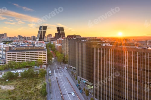 Preview: Madrid, Spain financial district skyline at dusk.