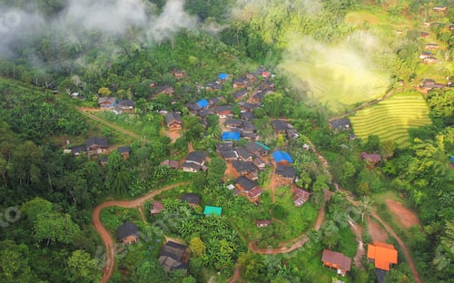 Preview: Aerial view of rural village and rice terraces field in the mountain in by drone