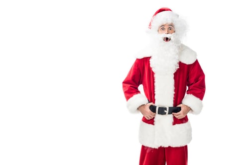 Preview: shocked santa claus standing isolated on white background
