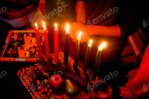 Preview: Family celebrating Kwanzaa, elevated view