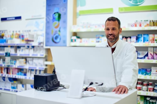Preview: Pharmacist Assisting Customers at a Modern Pharmacy Counter with Computer