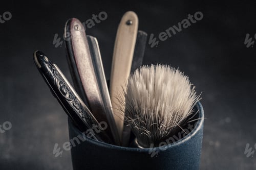 Preview: Closeup of tols for shave with old razor and brush