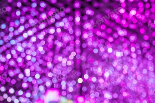 Preview: Abstract vivid violet bokeh bokeh light background. purple light show festival at night.