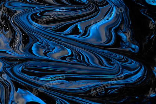 Preview: Close-up shot of thick paint of various bright colors flowing down and mixing together