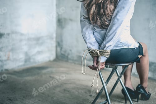 Preview: woman hands bound. Women were handcuffed and Sitting on a chair.woman tied hand to a chair.Crime Con