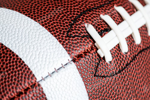 Preview: Macro shot of American football ball background