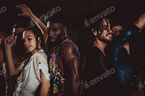 Preview: Group of friends dancing in the rain