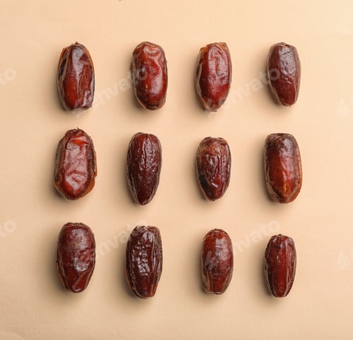 Preview: Sweet dried date fruits on color background, top view