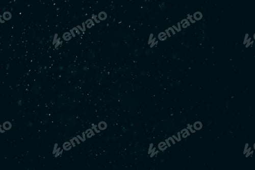 Preview: White snow falling in black night sky in the dark