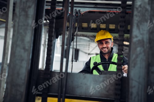Preview: Industrious Engineer Operating Forklift in Warehouse. Efficient Forklift Driving in Factory.