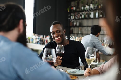 Preview: People having meal together in a restaurant