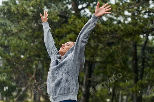 Preview: Beautiful Woman Enjoying Rainy Day After Intense Run