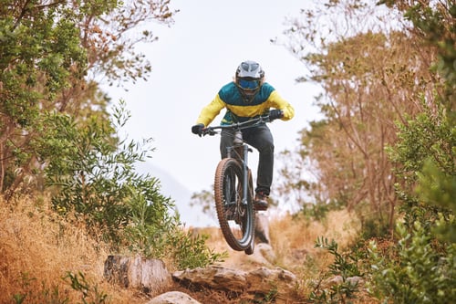 Preview: Bike, cyclist and sport, cycling in the woods, fitness and energy with extreme sports outdoor. Bicy