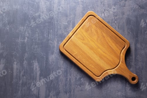 Preview: Meat or bread cutting board for homemade baking on table. Food recipe concept at stone background