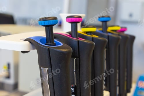 Preview: Chemical or Clinical laboratory tools. Automatic pipettes are on the holder