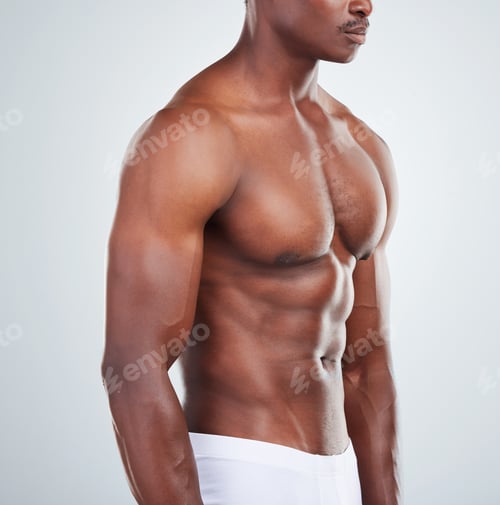 Preview: Closeup of one African American fitness model posing topless in a underwear and looking muscular.
