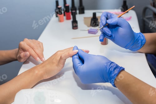 Preview: Nail Technician Applying Gel Polish in Salon