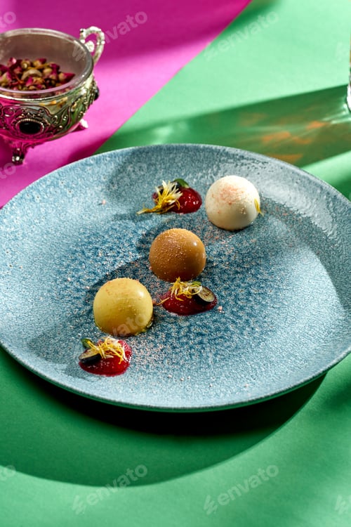 Preview: Dessert chocolate mousse cakes in a plate on bright backgrounds. Selective focus, hard shadows