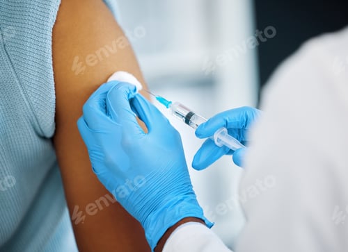 Preview: This might make you drowsy. Shot of a doctor giving her patient an injection.