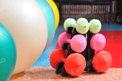 Preview: Photo of sports equipment, dumbbells and fitness balls