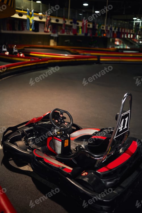 Preview: red racing car inside of indoor kart circuit, motor race vehicle, go cart kart for speed racing