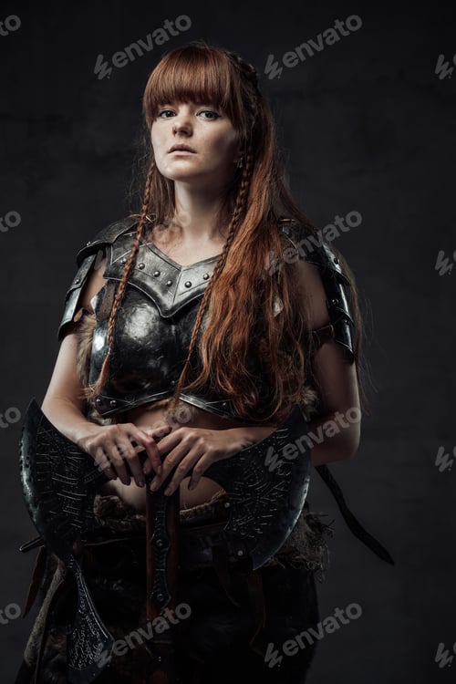 Preview: Beautiful woman viking with two handed axe in dark background