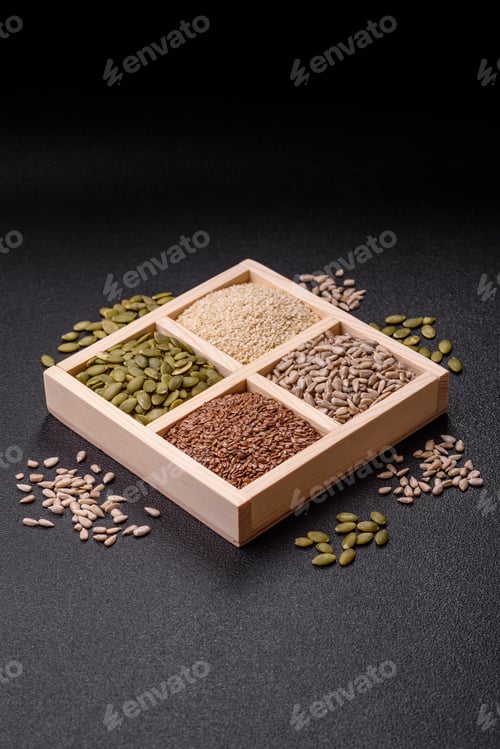 Preview: Sunflower, pumpkin, flax and sesame seeds in a wooden box