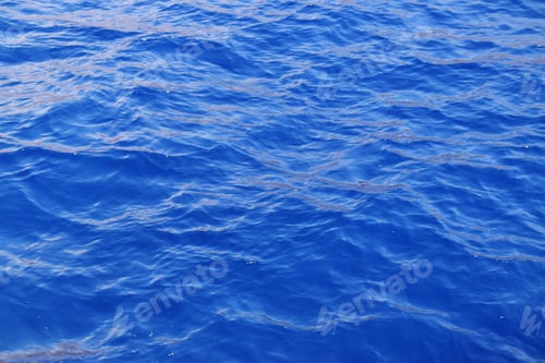 Preview: indigo blue ocean water and slight waves