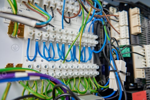 Preview: Electrical wires connecting to electrical circuit board in distribution box