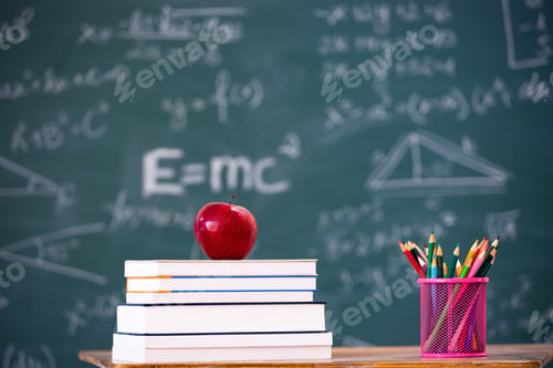 Preview: Pencils and book and blackboard. Education concept.