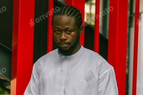 Preview: Cheerful male tourist portrait dress in white wear dashiki ethnic smiling at city street or small