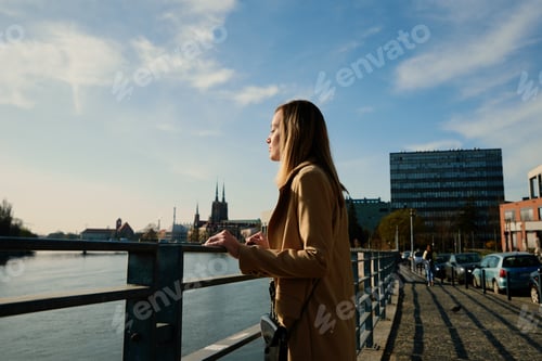 Preview: Cheerful woman walks at europe city street