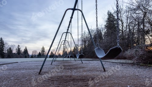 Preview: Empty playground during a frosty winter morning