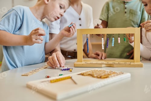 Preview: montessori school concept, multicultural children playing with color bead stairs near teacher