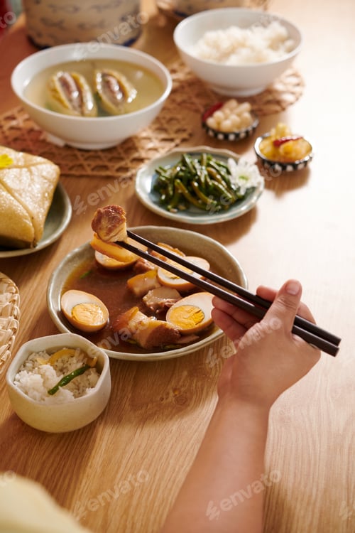 Preview: Person Eating Braised Pork