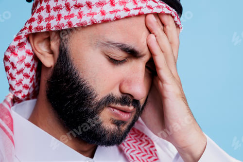 Preview: Arab man suffering from migraine symptom