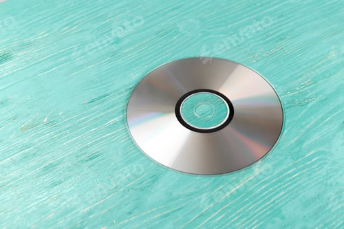 Preview: CD disk on wooden table